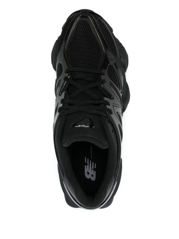 New Balance
9060 caged black